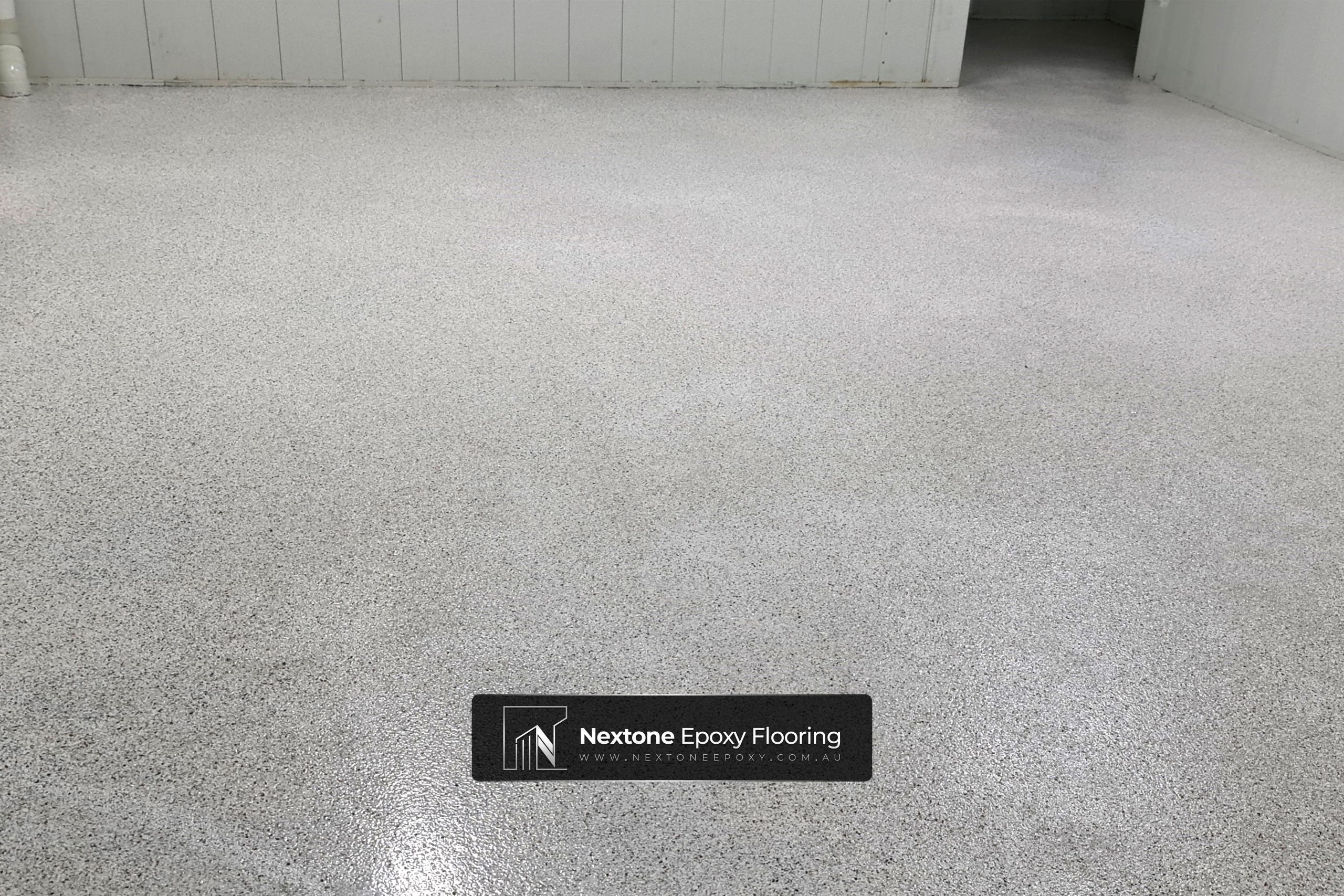 Epoxy flake floor for home/residential garage - black and white